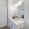 a bathroom with a large mirror