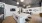 a kitchen with a bar stools