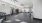 a room with treadmills and a fan