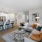 a large living room with a large kitchen and dining area