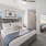 a bedroom with a bed and a chair